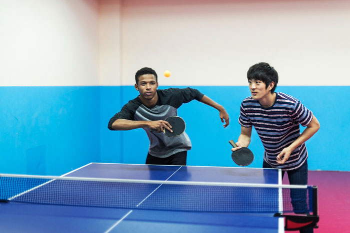 friends-playing-table-tennis-Optimized